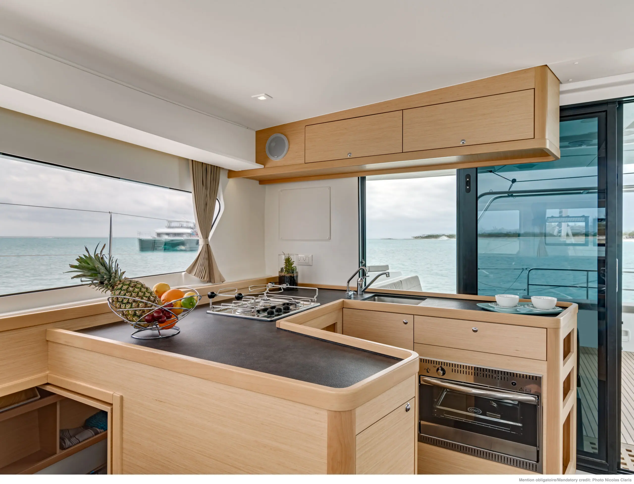 l42-ncz1738-a3 Lagoon_catamaran_storage_planning_tips_galley_saloon